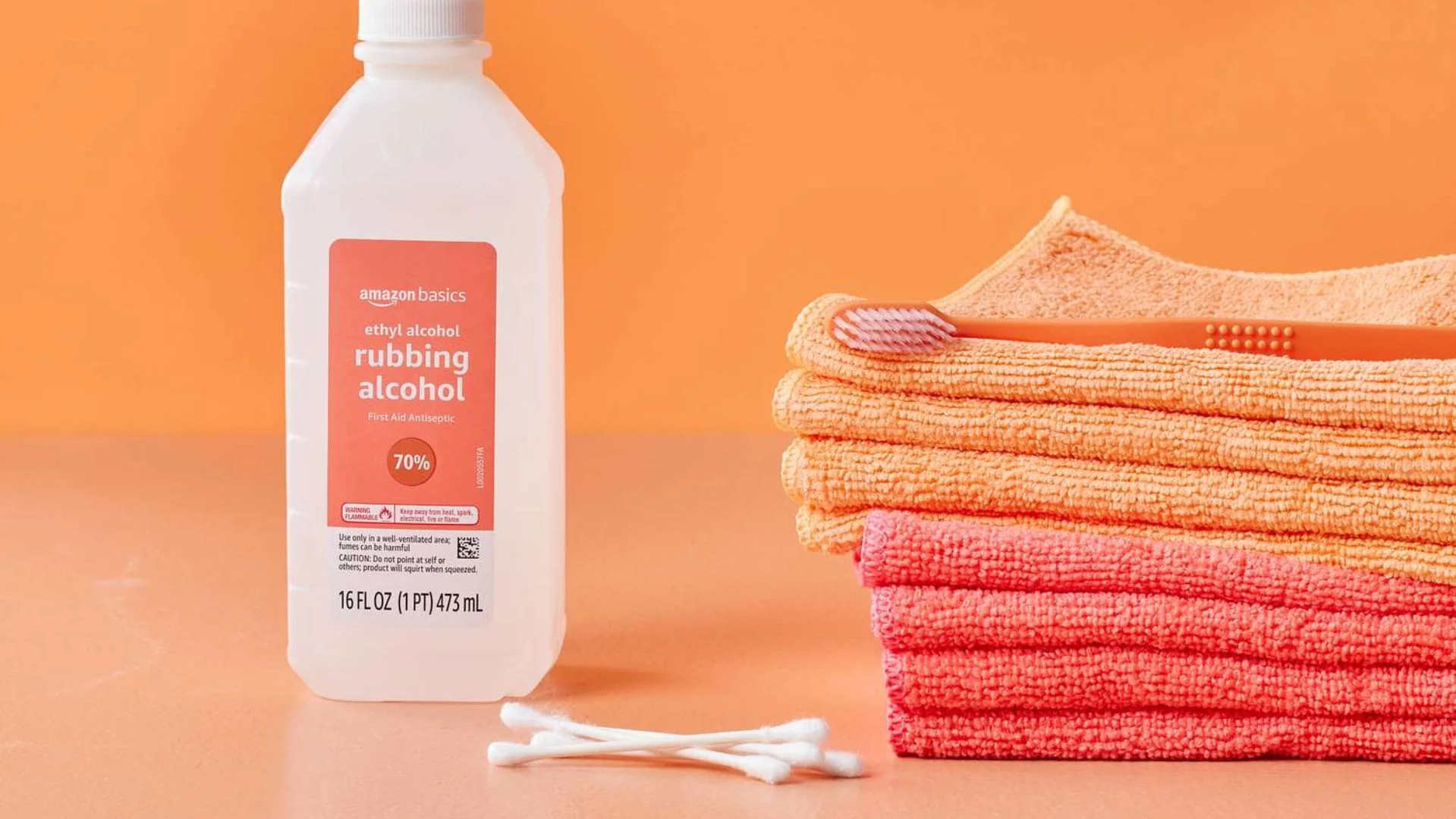 Isopropyl rubbing alcohol for removing dried acrylic paint from wood