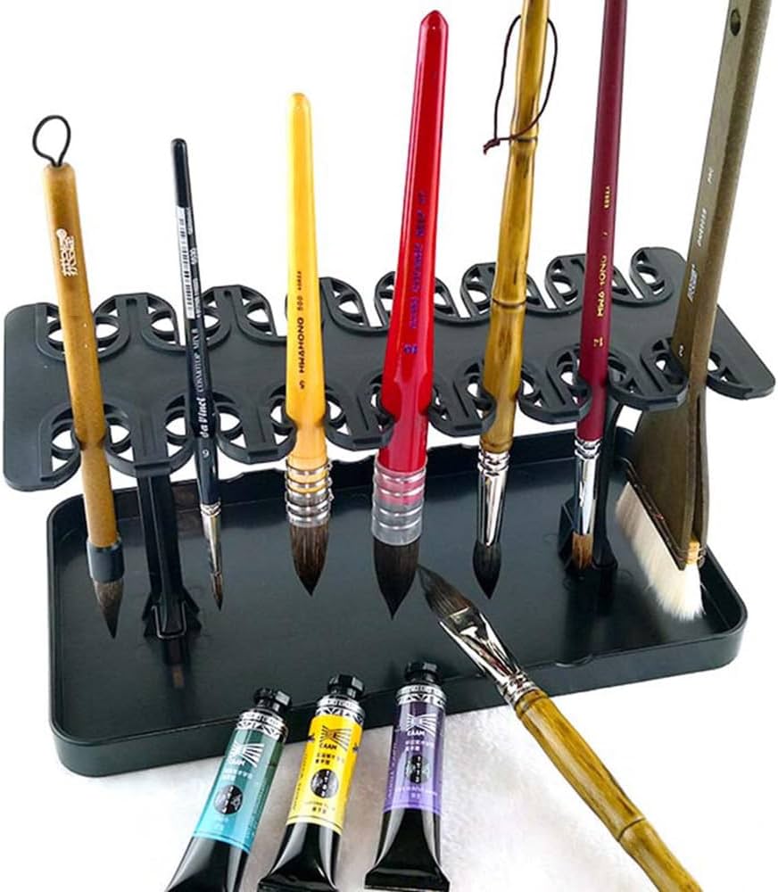 Paint brushes drying on a brush drying rack