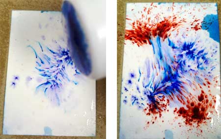 Brusho crystal colour sprinkled onto wet watercolour paper, blooming into colour