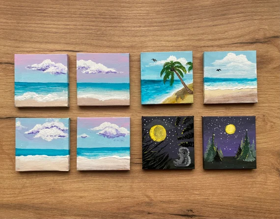 Row of mini acrylic paintings on small canvases